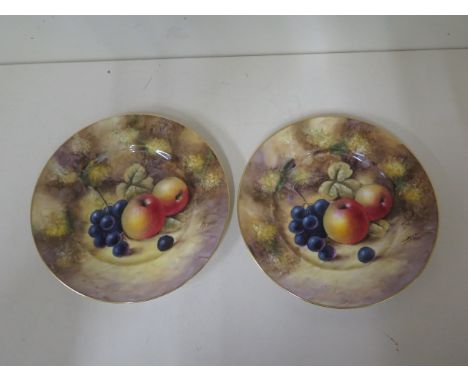 A pair of Royal Worcester fine bone china side plates with fruit still life on a mossy bank - diameter 20cm - signed J Smith 