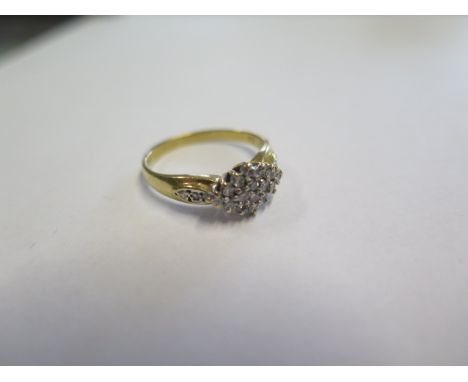 A hallmarked 18ct yellow gold and diamond cluster ring, size N/O, approx 3.4 grams, generally good condition, diamonds bright