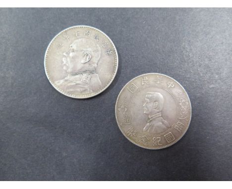 A Republic of China Silver Momento Dollar (Yuan) 19247 portrait of Sun Yat Sen and another - total weight approx 53.5 grams 