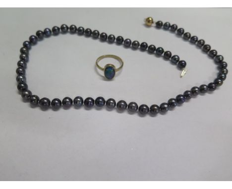 A necklace with a 14ct gold clasp, 44cm long, and a hallmarked 9ct opal ring, size S, approx 2.8 grams, both generally good 