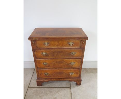 A new walnut Bachelors chest of small proportions with a fold over top above four drawers, made by a local craftsman to a hig