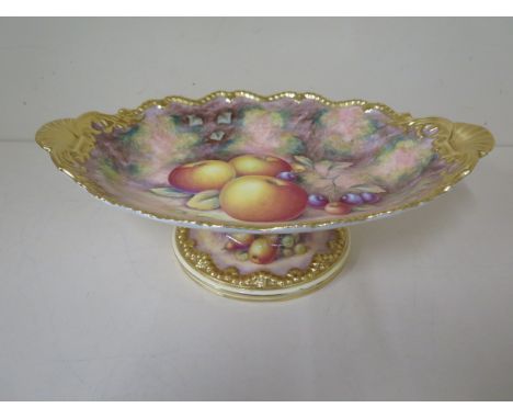 A Royal Worcester oval fine bone china dish on stand with fruit still life on a mossy bank signed Telford with gilt borders a