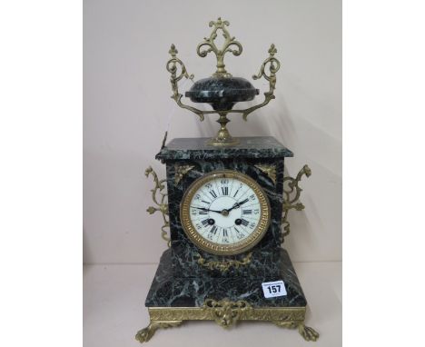 A French varigated marble mantle clock, 8 day movement, case decorated with gilded mounts, ceramic dial showing hours and min