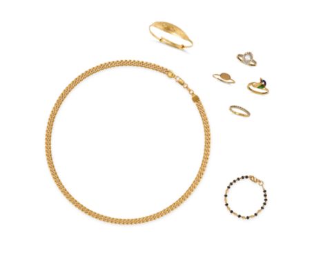 A COLLECTION OF GOLD JEWELLERY comprising four gold rings set with white gemstones, enamel detailing and plain gold, three st