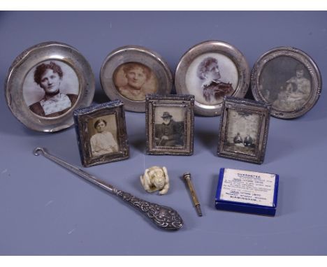 SEVEN SMALL HALLMARKED SILVER PORTRAIT FRAMES and other small collectables, four of the frames round, 9cms diameter the large