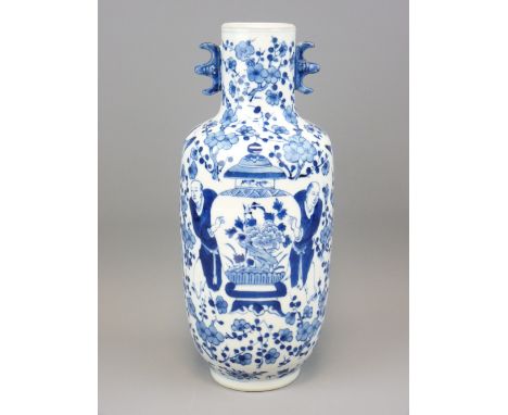 BLUE &amp; WHITE ORIENTAL FIGURAL VASE with floral background, 31cms H, Kangxi marks to the base, 19th Century (possibly alte