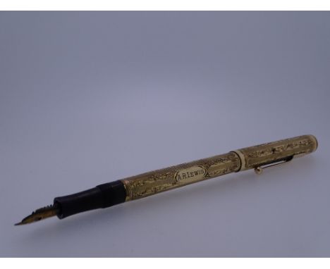 SWAN MABIE TODD - Vintage (1920s - 1930s) Gold Filled Swan Mabie Todd Self Filler fountain pen with ornate leaf pattern and S