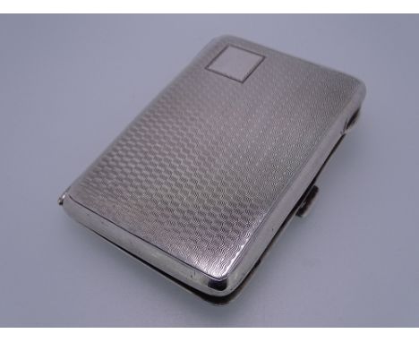 A LADY'S CIGARETTE CASE, engine turned, by John Rose, Birmingham 1927, 2.5ozs