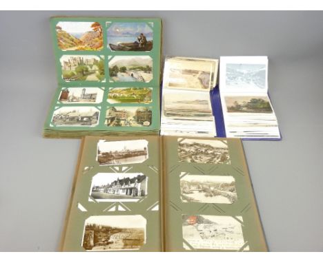 VINTAGE POSTCARD COLLECTION - 550 plus cards within three albums, British and overseas including early seaside and city scene