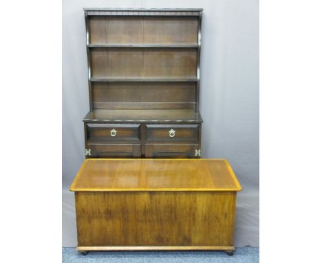 TWO REPRODUCTION FURNITURE ITEMS to include a neatly proportioned oak dresser, 164cms H, 52cms W, 41.5cms D and a lidded blan