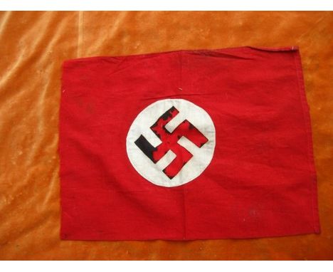 NAZI VETERAN BRING BACK FLAG- a small original Nazi Party flag, a veteran’s bring back item, the swastika being deliberately 