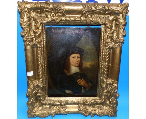 A late 17th / early 18th century Continental School half-length portrait of a young man in black cap and jacket, wearing ring