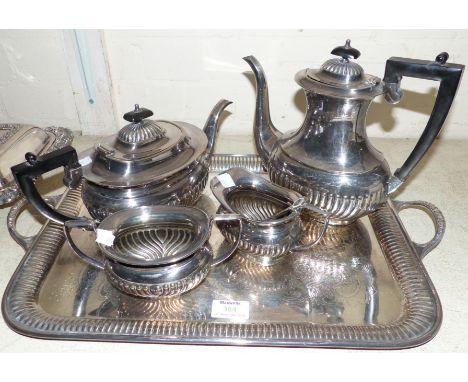 A Georgian style EPNS 4 piece tea service, tea strainer and 2-handled tray