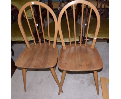 A set of 4 Ercol style elm and beech hoop and stick back dining chairs, with impressed BS mark, dated 1960