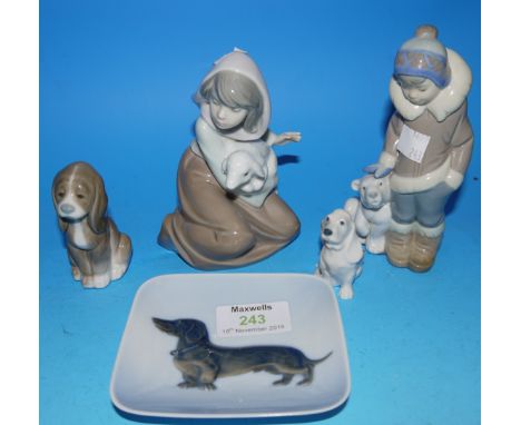 Two Lladro figures of children, and a dog; a Royal Copenhagen ashtray and puppy
