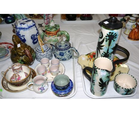 A majolica frog jug; decorative pottery including Poole, etc.