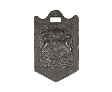 A George III leaded bronze 7lb wool weight, dated 1816, of shield form, cast with the Royal Coat of Arms beneath G III R cyph