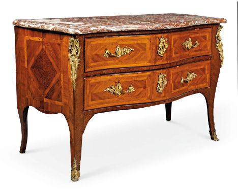 A Louis XV ormolu-mounted tulipwood parquetry commode, second quarter 18th century, the serpentine rouge Languedoc moulded ma