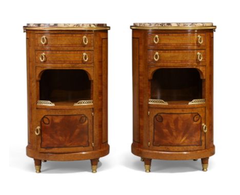 A pair of French inlaid burr walnut and satinwood crossbanded oval side cabinets, first quarter 20th century, marble tops abo