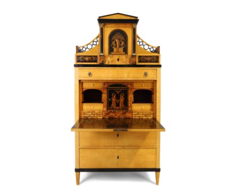 A Biedermeier satin birch and part ebonised secretaire abbatant, of architectural form, second quarter 19th century, the uppe