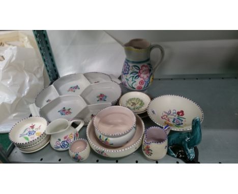 A quantity of various Poole Pottery items.
