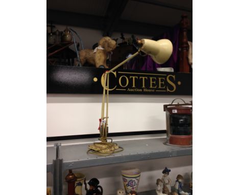 An early 20th century cream painted stepped based Herbert Terry angle poise lamp.