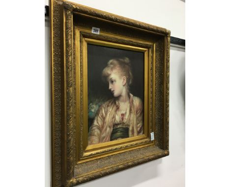 A gilt framed and glazed Oleograph: Portrait of a Young Girl.