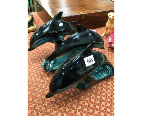 Three large Poole Pottery Dolphin ornaments.