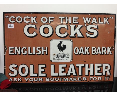 An early 20th century enamel sign: "Cock Of The Walk" Cock's English Oak Bark Sole Leather.  Ask your boot maker for it by th