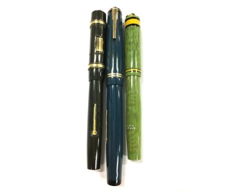 Three rare vintage Mabie Todd Swan fountain pens to include a green and yellow pastel, Model No. N92, double banded hard rubb