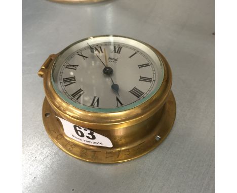 A small Sestrel brass cased alarm clock.