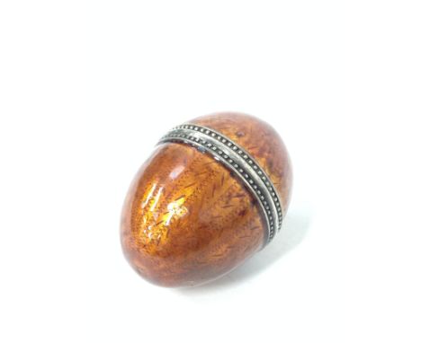 A Russian silver and enamel egg shaped container, impressed 84 and MH maker's mark. height 6cm approx., diameter 4cm. Some da