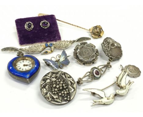 A bag of mixed jewellery mostly silver and white metal including a David Anderson brooch, Guilloche enamel heart shaped watch