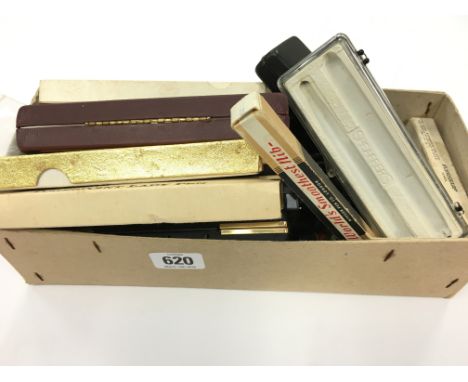 A quantity of vintage and modern writing equipment to include boxed fountain pens, propelling pencils and various other writi
