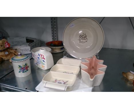 A small quantity of various Poole Pottery items.