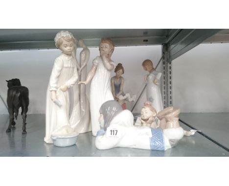 A collection of various Nao china figures modelled as Children together with another Circle of Love figure by Kim Lawrence: T