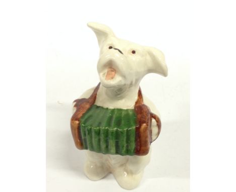 A Beswick china model of a Dog playing an accordion.