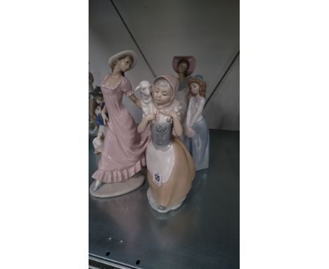 Four various Nao china ornaments modelled as Young Girls.