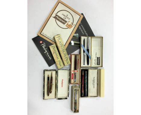 A quantity of various modelled Platignum fountain pens and propelling pencils with original vintage booklets.