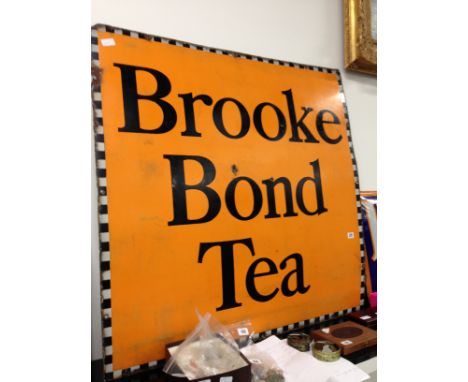 An early 20th century enamel advertising sign: "Brooke Bond Tea" on orange background (101 x 101cm).