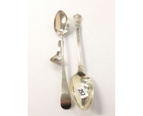 A Victorian Kings pattern silver basting spoon together with a Georgian silver basting spoon and a Georgian silver caddy spoo