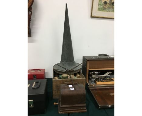 An early 20th century Edison Gem phonograph in original oak carrying case together with two brass gramophone horns together w