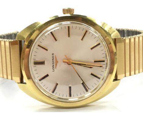 A Gentleman's gold plated cased Longines manual winding wristwatch, silver dial, gold baton numerals with gold hands, model N