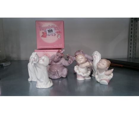 A collection of various Nao (seven) novelty china figures.