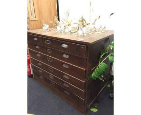 A large oak six drawer map chest.