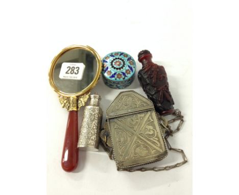 A small ladies' jewelled gilt metal Eastern hand mirror with semi precious stone handle together with an Eastern enamel and s