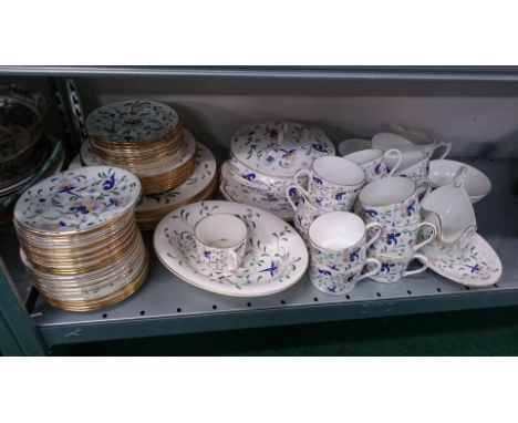 The residue of a Coalport bone china tea and dinner service decorated in a stylised floral pattern.