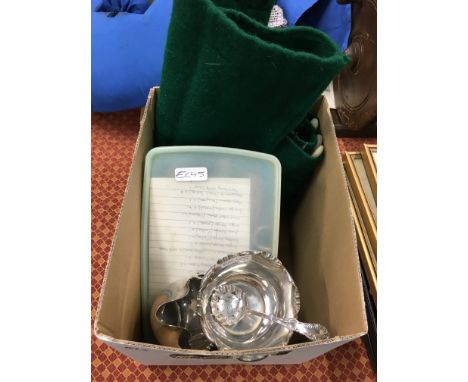 A box containing silver plated items including cutlery and the residue of a mother of pearl handled and silver plated dessert