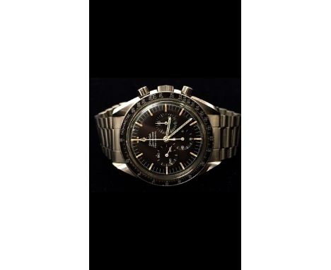 A gentleman's stainless steel cased Omega Speedmaster Professional Pre Moon wristwatch, black chronograph dial with white and