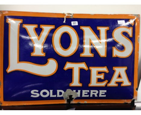An early 20th century convex enamel advertising sign: "Lyons Tea Sold Here" (hole to centre lower edge and corner).
